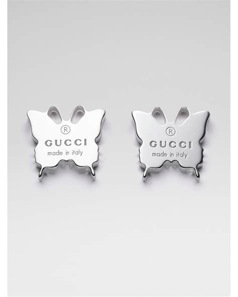 gucci sterling silver trademark butterfly thin ring|Gucci interlocking gg earrings.